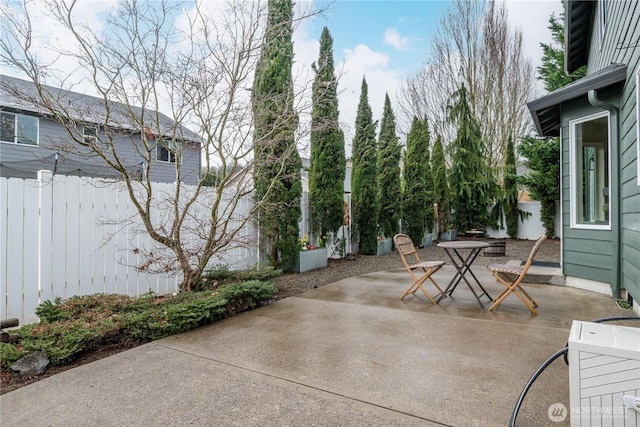 view of patio with fence