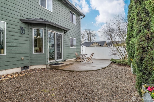 exterior space featuring a patio and fence