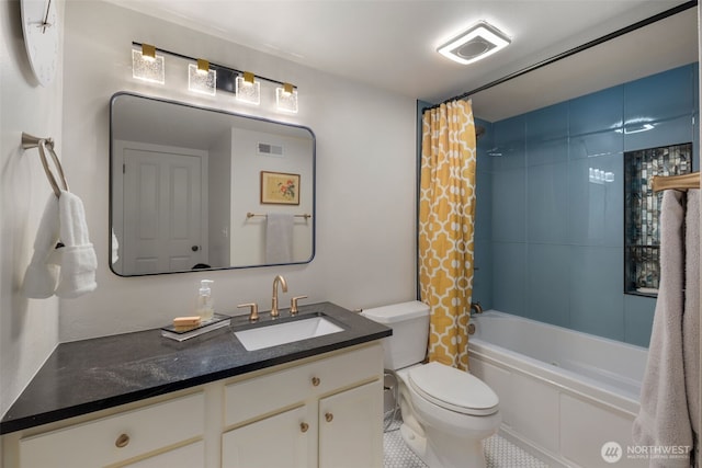 bathroom featuring toilet, visible vents, vanity, and shower / bath combo with shower curtain