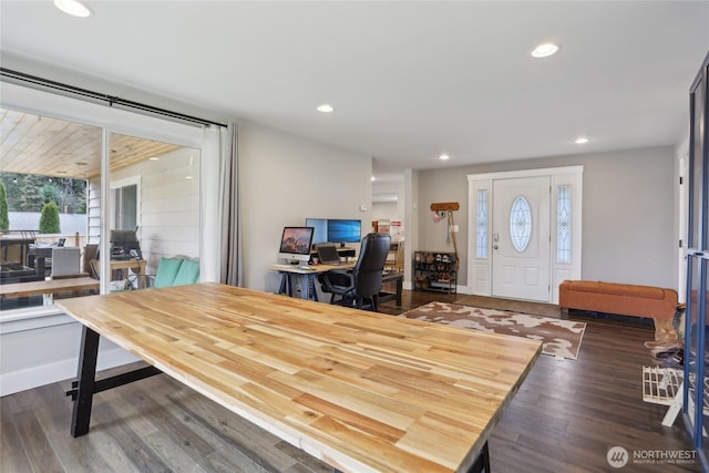 office area with recessed lighting, a healthy amount of sunlight, baseboards, and wood finished floors