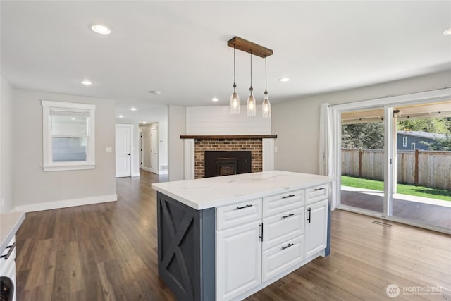 kitchen featuring white cabinetry, pendant lighting, dark wood-style floors, and recessed lighting