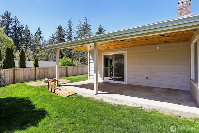 view of yard featuring a fenced backyard and a patio area
