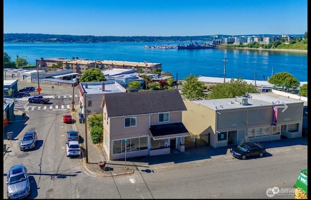 drone / aerial view with a water view