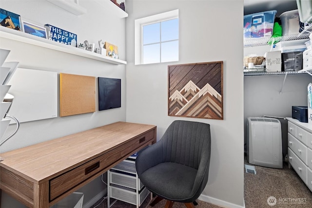 office with baseboards and carpet