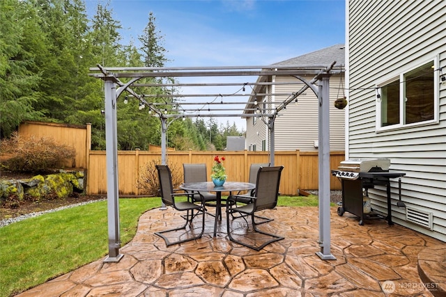 view of patio featuring grilling area, fence, outdoor dining space, and a pergola