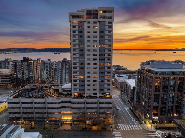 property's view of city with a water view