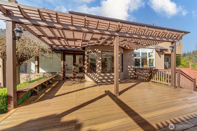 wooden deck featuring a pergola