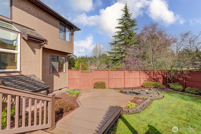 view of yard with a fenced backyard