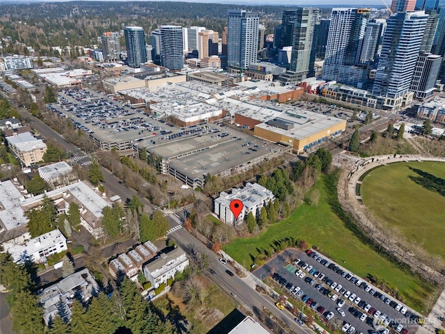 birds eye view of property with a city view