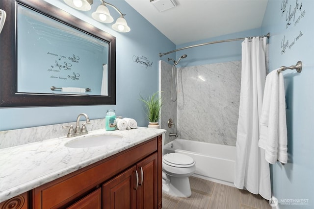 full bathroom with visible vents, toilet, shower / bath combo, and vanity