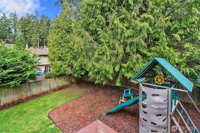 view of play area featuring fence