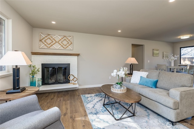 living room featuring wood finished floors and recessed lighting