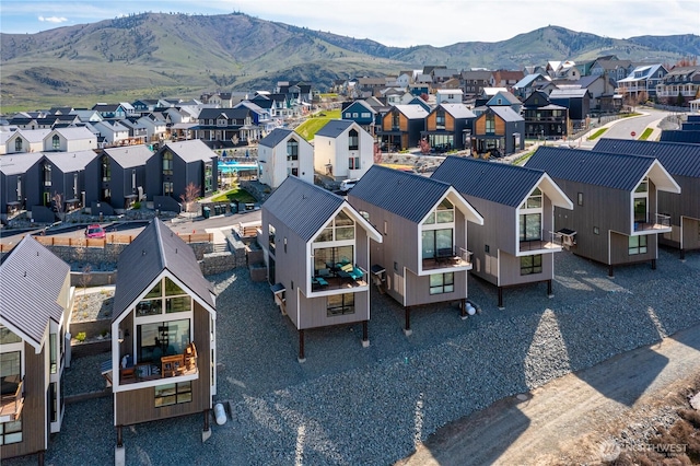 aerial view with a mountain view and a residential view