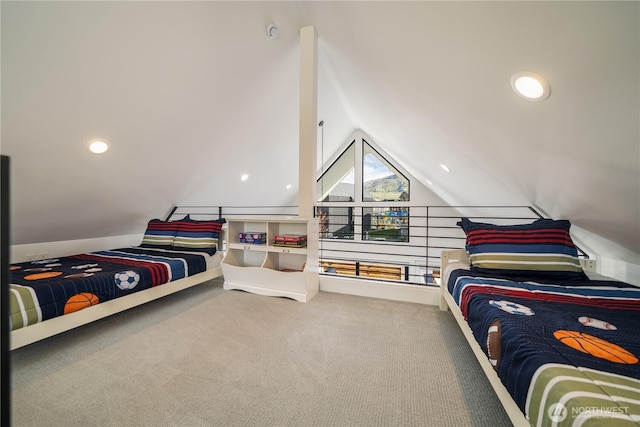 bedroom with carpet and vaulted ceiling