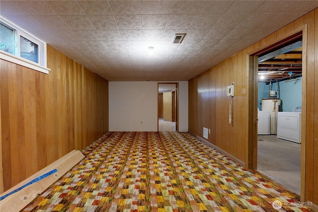 515 SE 5th St, College Place, WA 99324 - finished basement featuring wooden walls, visible vents, and washer and dryer