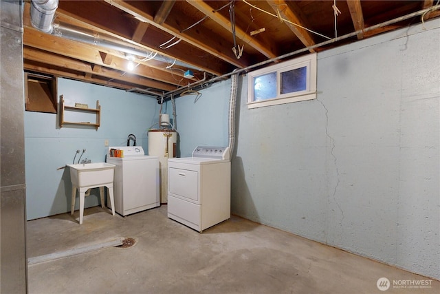 515 SE 5th St, College Place, WA 99324 - basement with a sink, electric water heater, and washer and dryer