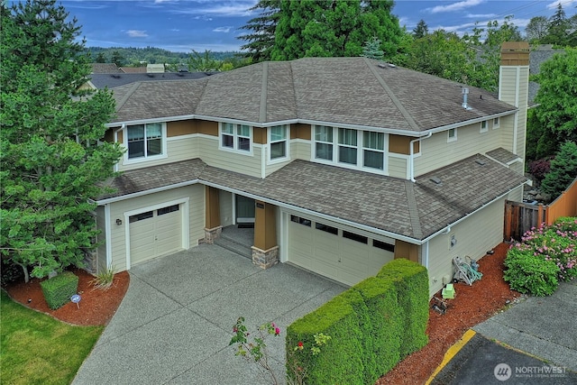 view of front of house with stone siding, aphalt driveway, roof with shingles, and an attached garage