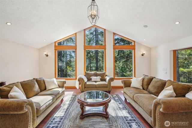 living room with vaulted ceiling, baseboards, wood finished floors, and recessed lighting