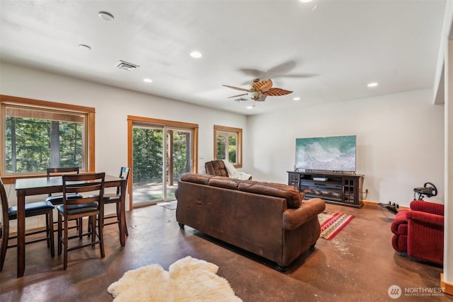 living room featuring ceiling fan, concrete floors, visible vents, and recessed lighting