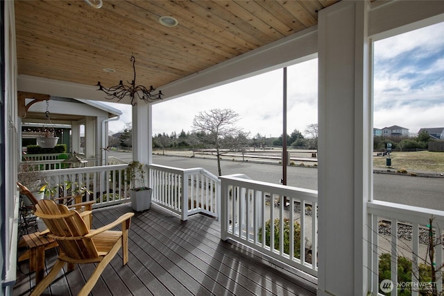 wooden deck with a porch