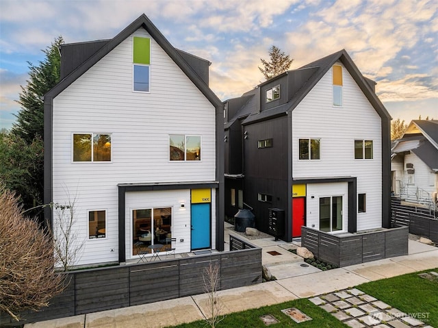 rear view of property featuring a patio