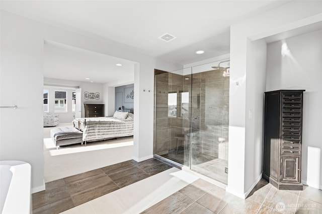 full bath featuring visible vents, baseboards, ensuite bathroom, a shower stall, and recessed lighting