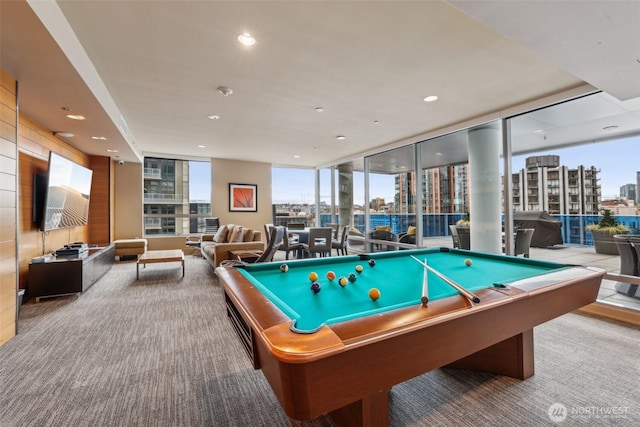 game room with carpet floors, pool table, a city view, and recessed lighting