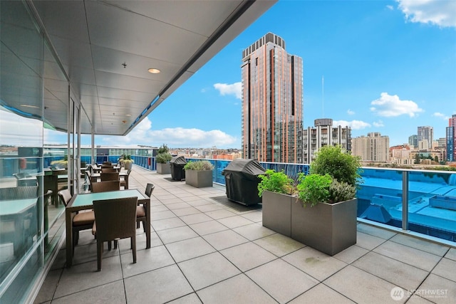 balcony featuring a view of city and grilling area