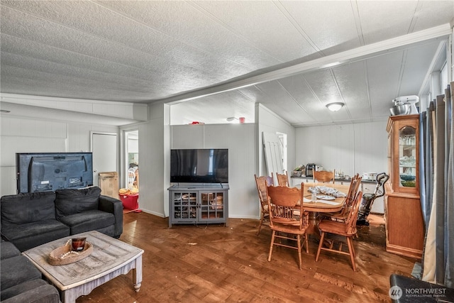 interior space with lofted ceiling and wood finished floors