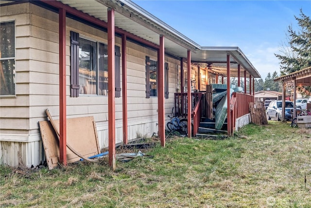 view of home's exterior featuring a yard