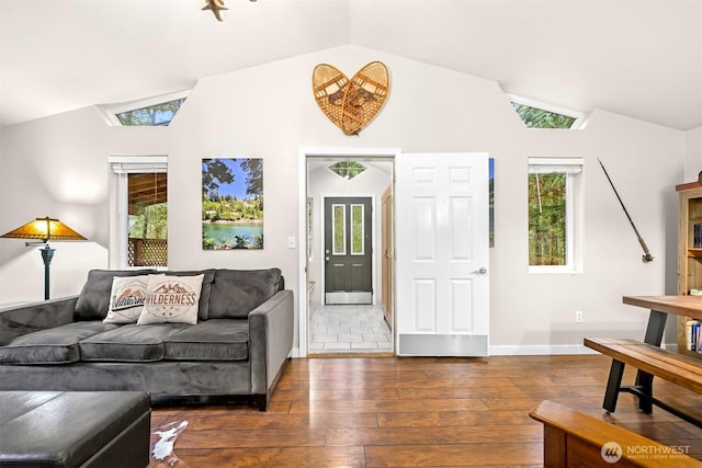 living room featuring baseboards, dark wood-style flooring, and vaulted ceiling