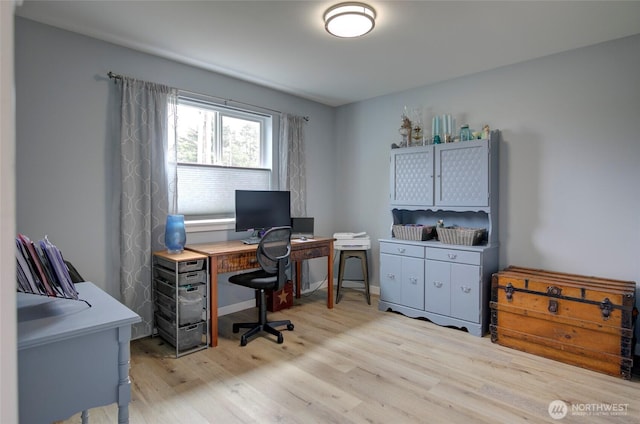 office area with light wood-style flooring