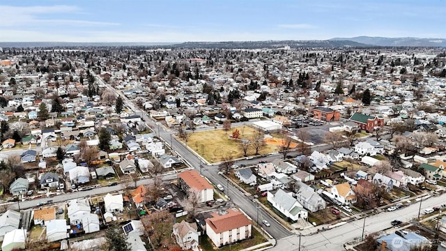 birds eye view of property with a residential view