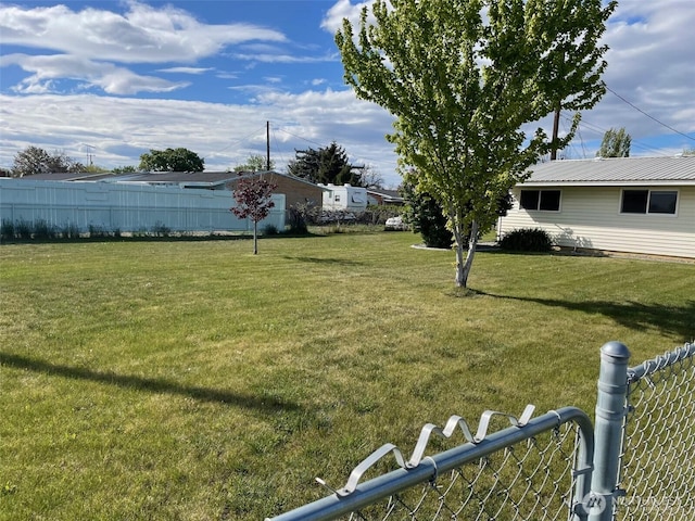 view of yard featuring fence