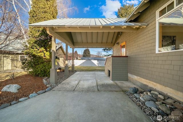 view of patio featuring fence