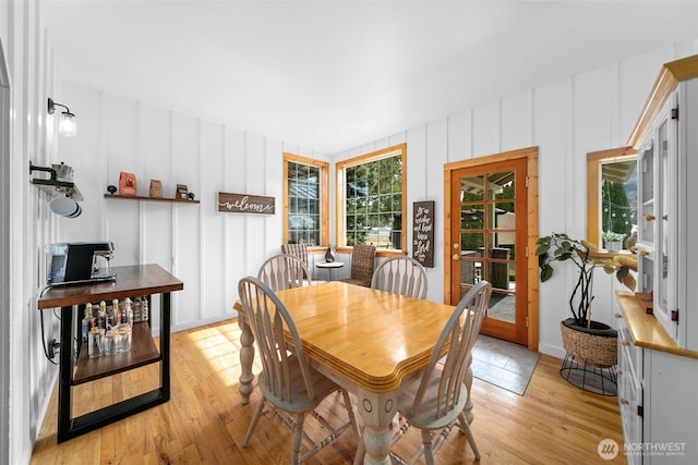 dining area with light wood finished floors