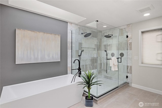 full bath with recessed lighting, a stall shower, a soaking tub, and baseboards