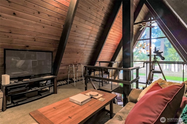 interior space featuring wood walls, wooden ceiling, ceiling fan, and lofted ceiling with beams