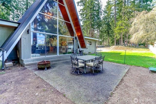 view of patio / terrace featuring a fire pit