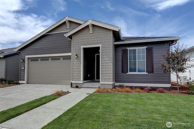 ranch-style home with an attached garage, driveway, and a front yard