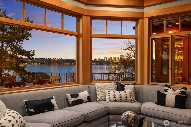 living room featuring a water view