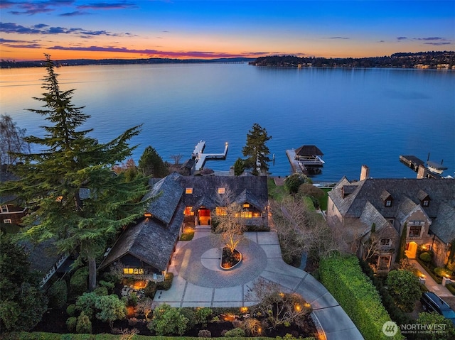 water view featuring an outdoor fire pit