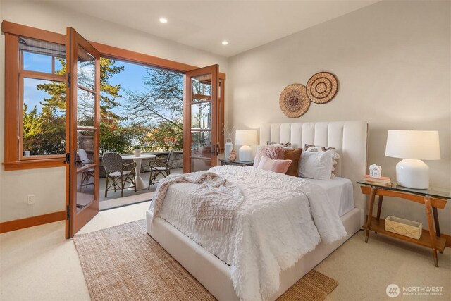 carpeted bedroom with access to outside, recessed lighting, and baseboards