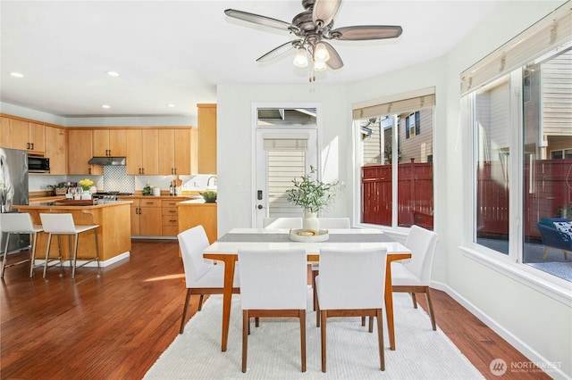 dining area featuring ceiling fan, baseboards, dark wood-style flooring, and recessed lighting