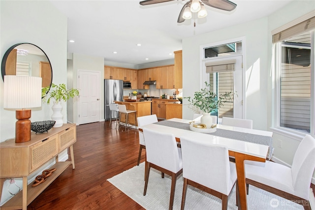 dining room with baseboards, a ceiling fan, dark wood-style flooring, and recessed lighting