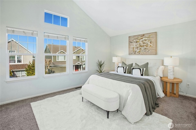 bedroom with carpet floors, visible vents, high vaulted ceiling, and baseboards