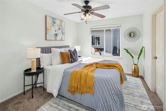 bedroom featuring ceiling fan, carpet, and baseboards