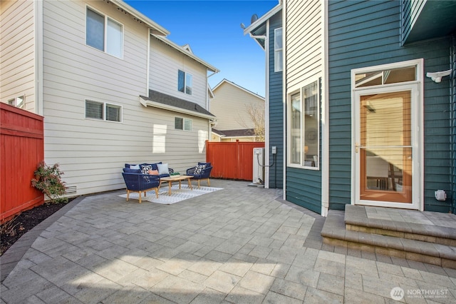 view of patio / terrace with fence and an outdoor hangout area