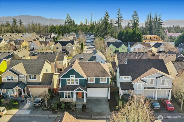 aerial view with a mountain view and a residential view