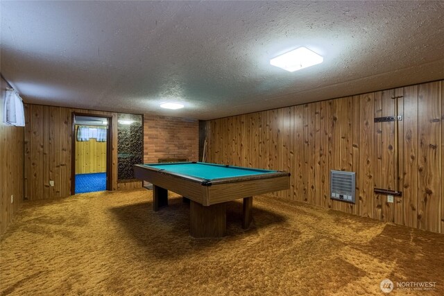 playroom featuring wood walls, a textured ceiling, billiards, and carpet floors